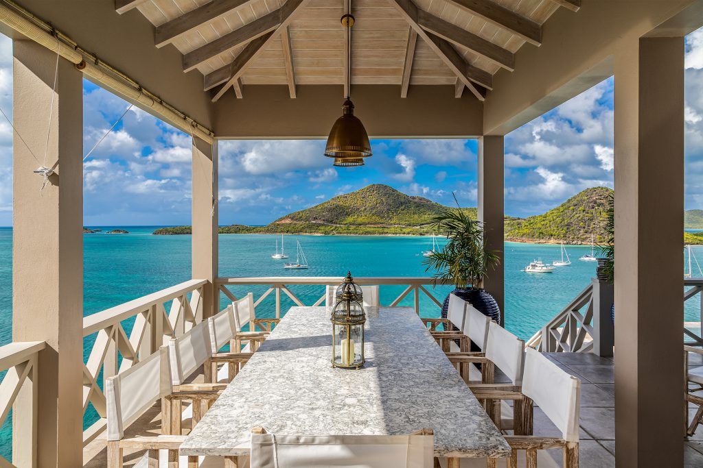 outdoor dining with ocean view antigua