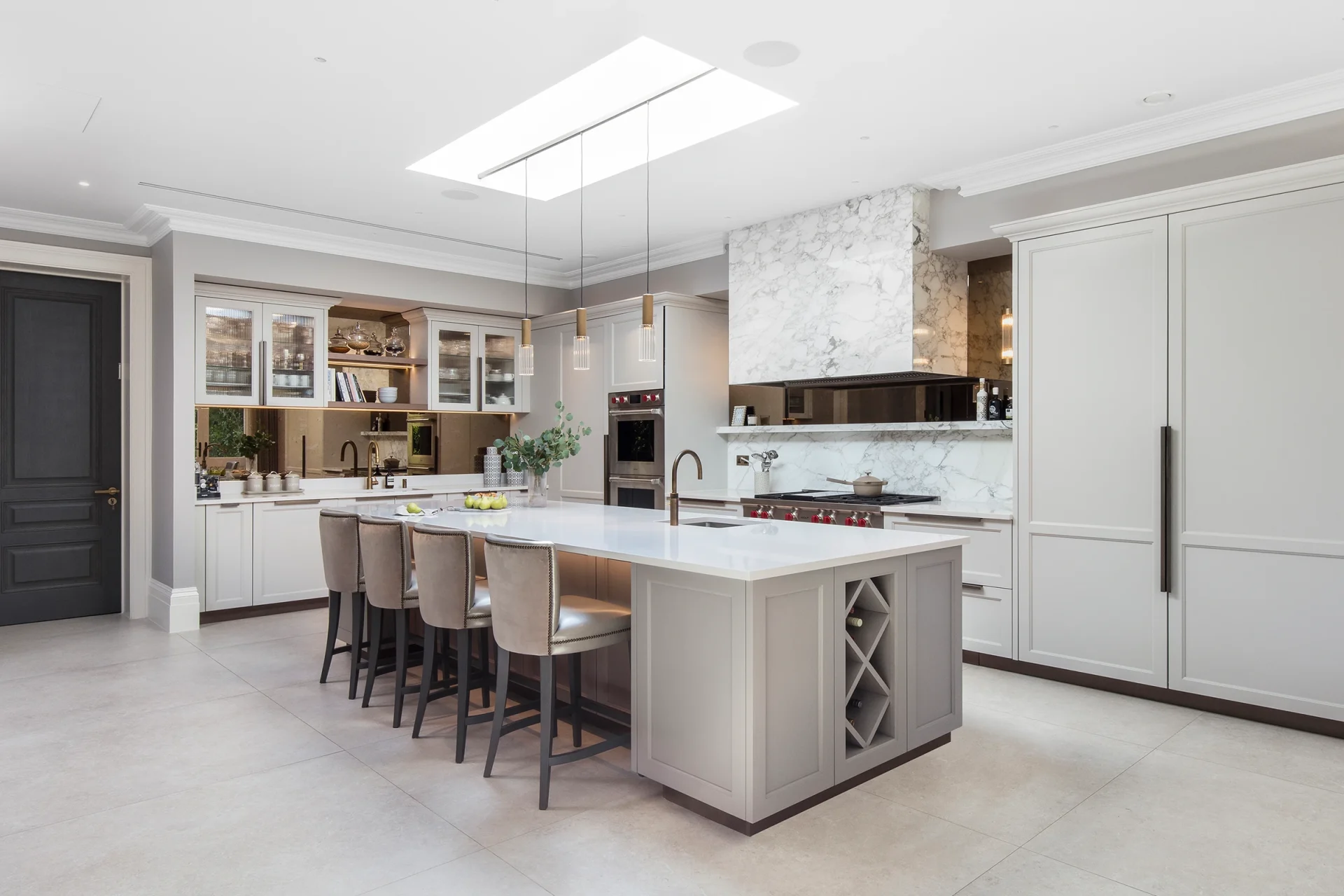classic kitchen with marble worktops and cooker hood subzero wolf appliances
