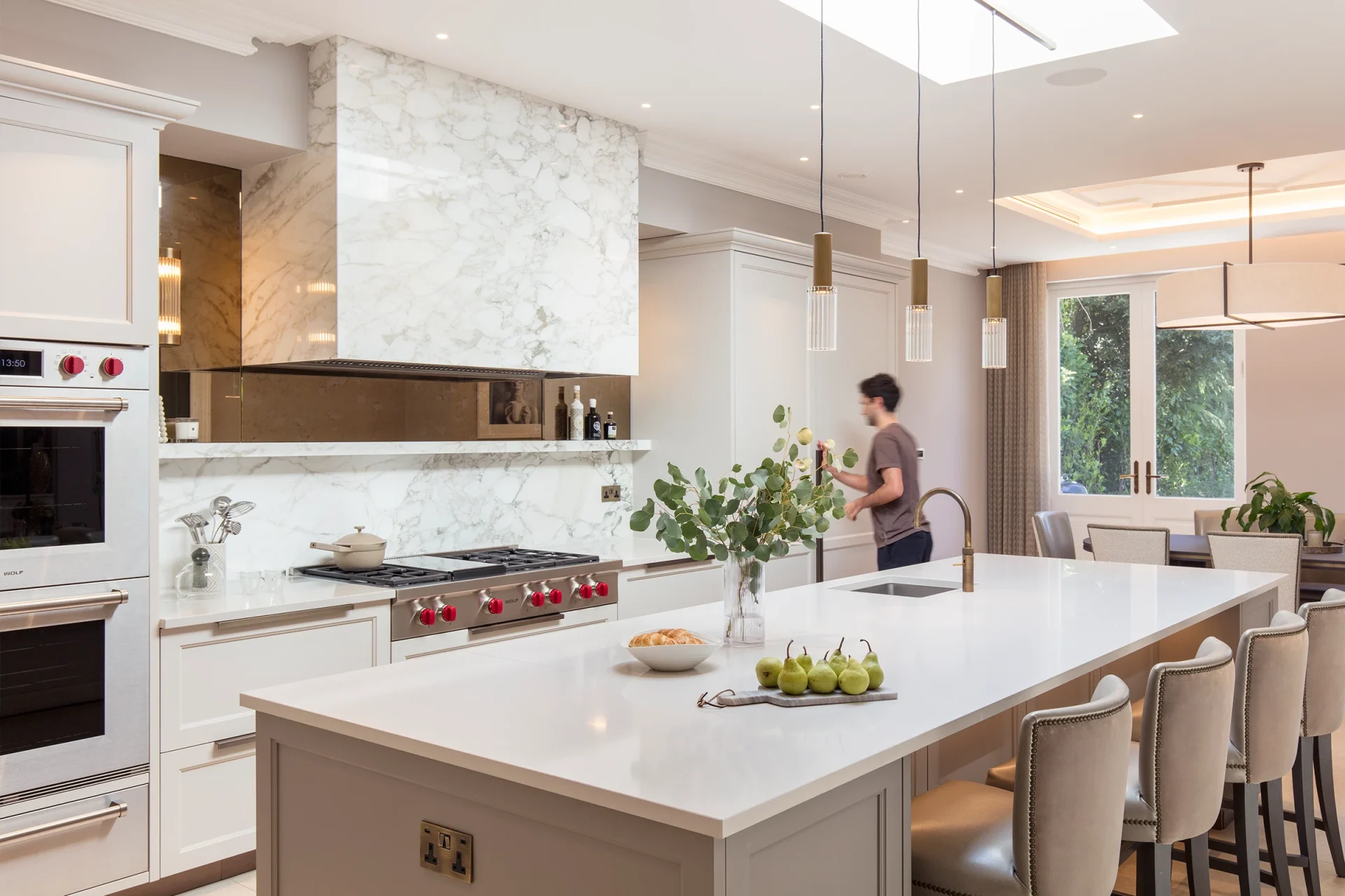 Modern classic kitchen with timeless shaker cabinetry, Calacatta Vaglioro marble, bronze splashback and premium luxury kitchen appliances.