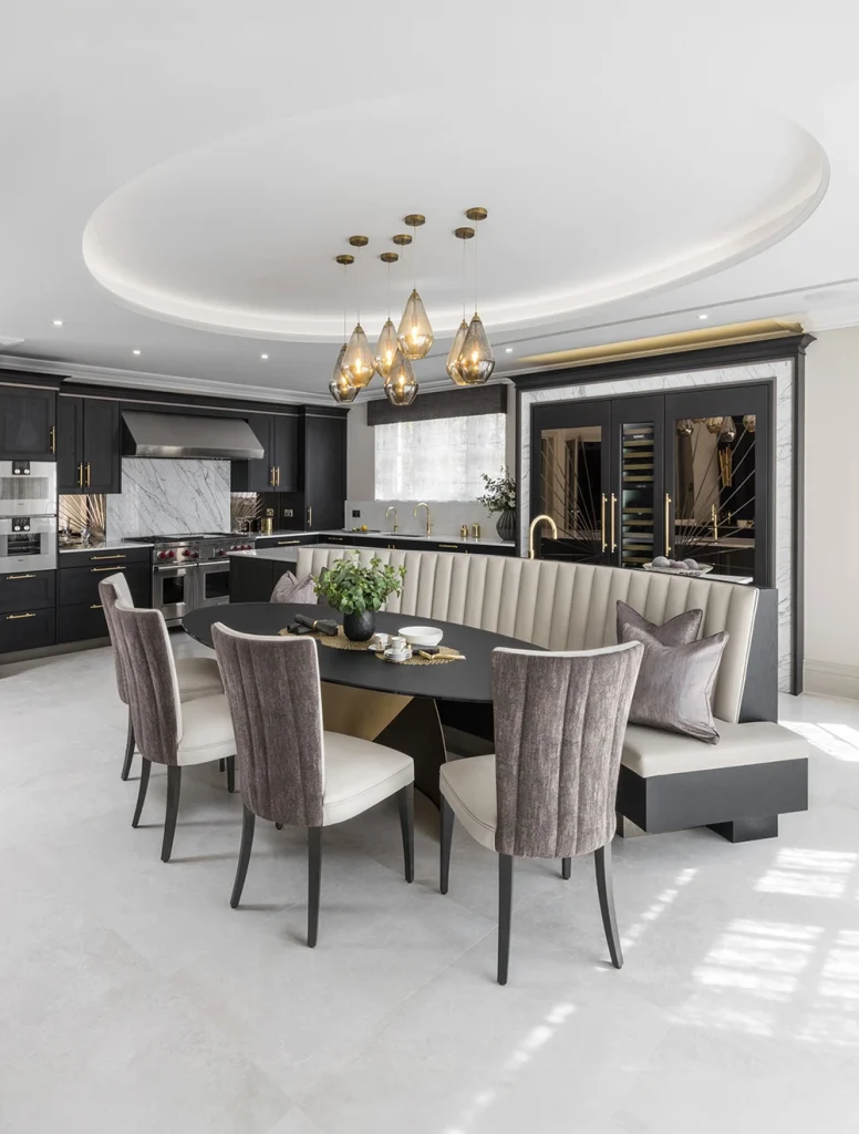 custom art deco kitchen with curved upholstered banquette seating integrated in the island