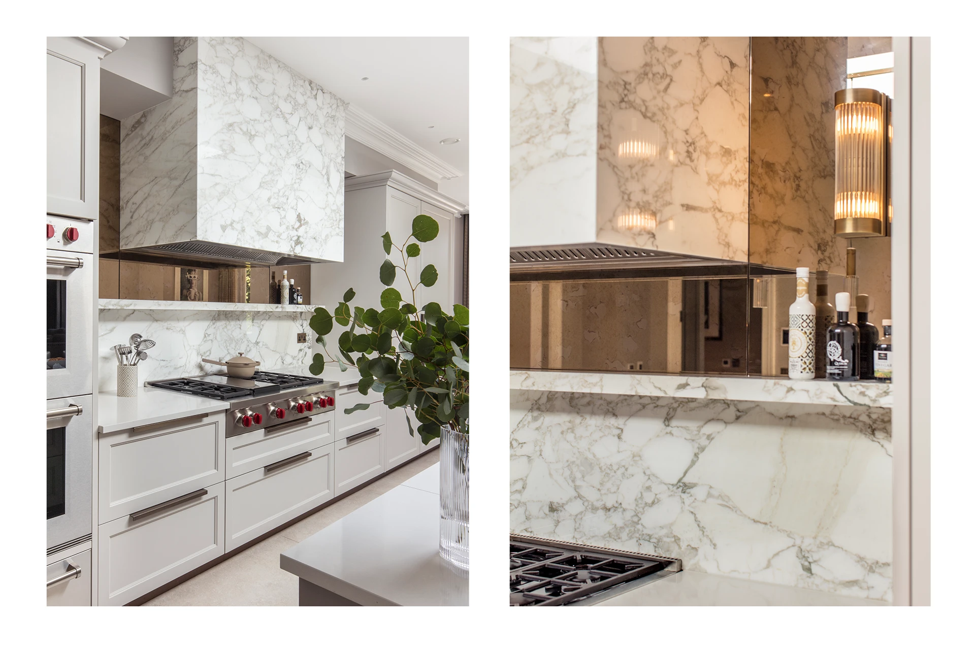 Cooker hood wrapped in Calacatta Vaglioro marble, with sweeping natural veining wrapping the mantle, floating shelf and splashback. Wolf cooker hood and Wolf integrated ovens in a classic yet modern shaker kitchen design. Bronze antique mirror splashback.